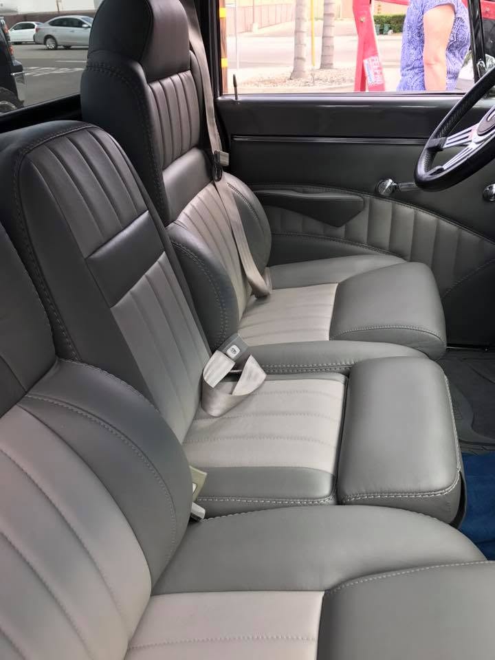 69 Chevy Custom gray leather bench seat with channel stitching in a classic pickup truck by Central Valley Upholstery