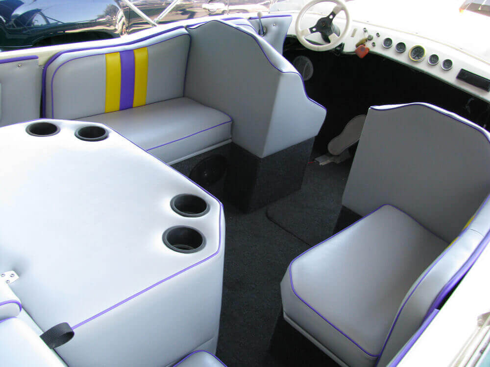 boat upholstery (3) Custom white and purple vinyl boat interior seating with cup holders by Central Valley Upholstery