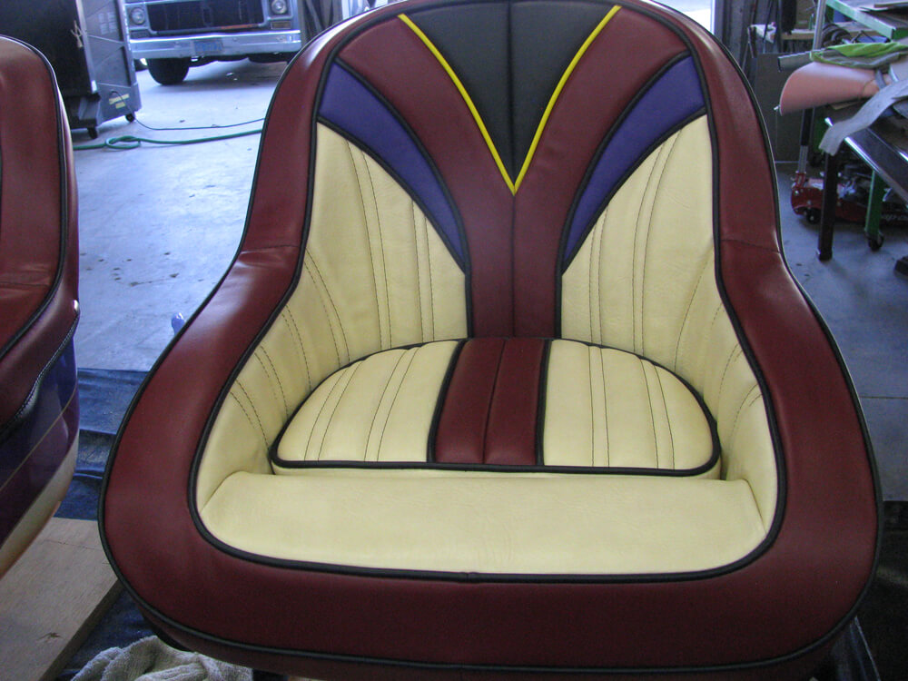 boat upholstery (4) Custom burgundy, cream, and blue vinyl boat bucket seat with pinstripe detailing by Central Valley Upholstery