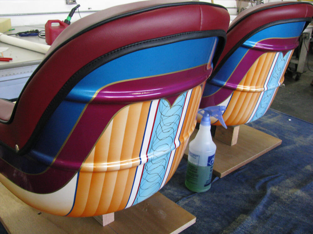 boat upholstery (5) Custom multicolor striped vinyl boat seat backs with airbrushed detailing by Central Valley Upholstery