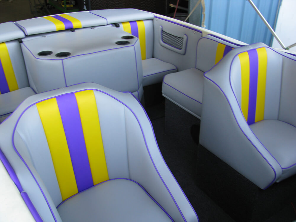 boat upholstery (9) Custom gray, yellow, and purple striped vinyl boat seating with center console by Central Valley Upholstery