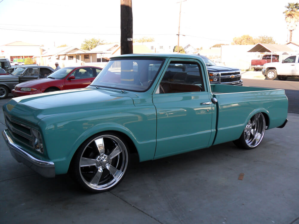 car seats (3) Restored teal 1967 Chevrolet C10 pickup truck with custom tan leather interior by Central Valley Upholstery