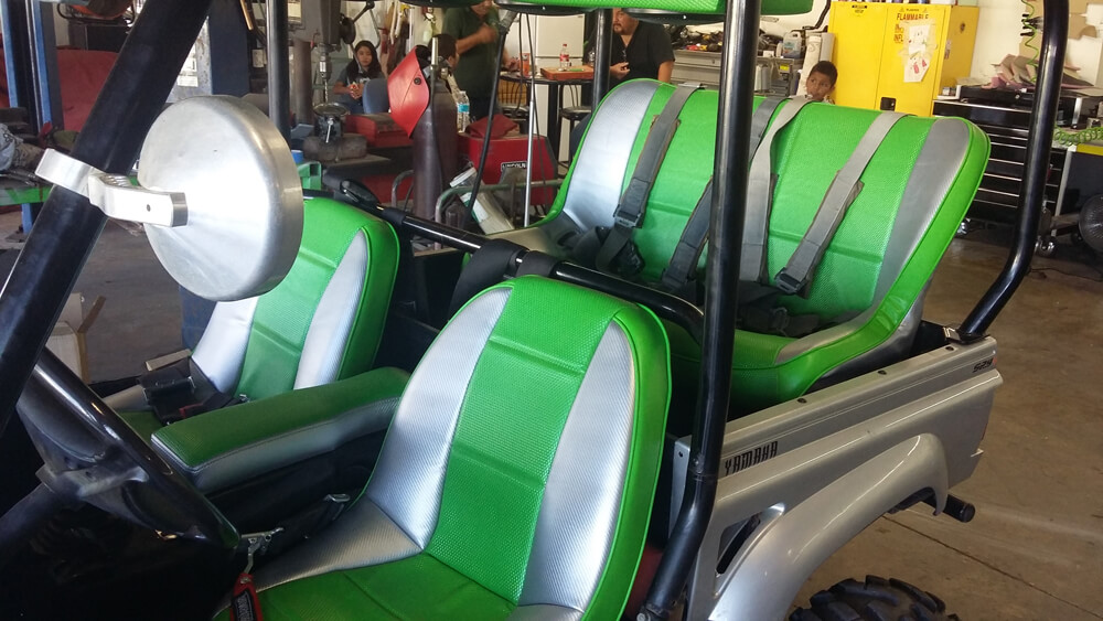 farm equipment upholsery (3) Custom green and silver vinyl bucket seats installed in a Yamaha utility vehicle by Central Valley Upholstery