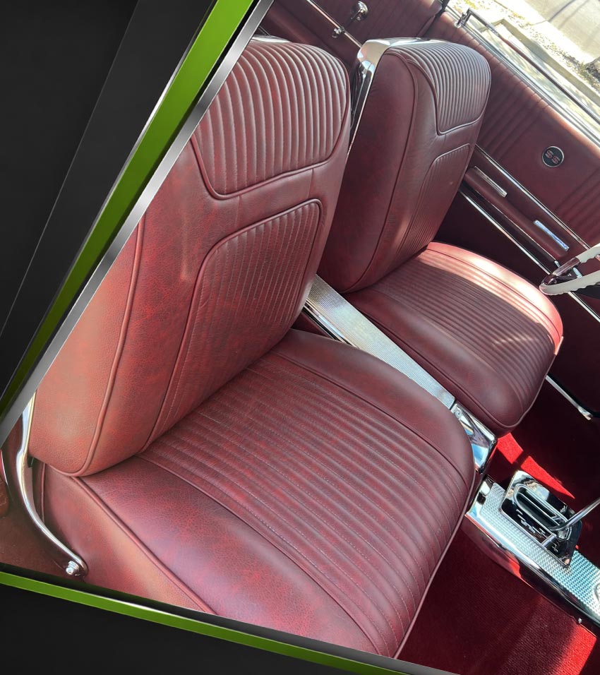 seats-upholstery Custom tan leather bench seats and center console with cup holders in a classic red hot rod interior by Central Valley Upholstery shop